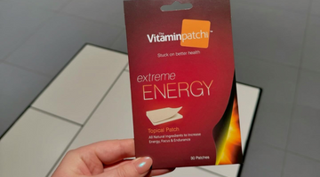 Hand holding the Extreme Energy Patch.