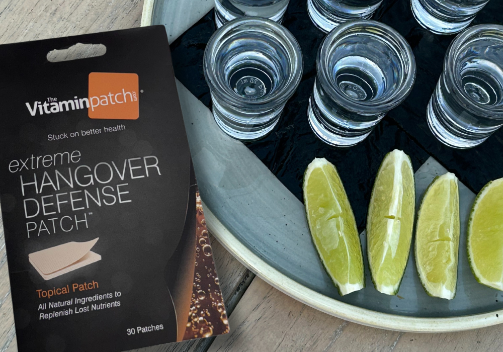 Extreme Hangover Defense Patch pack next to a tray of tequila shots